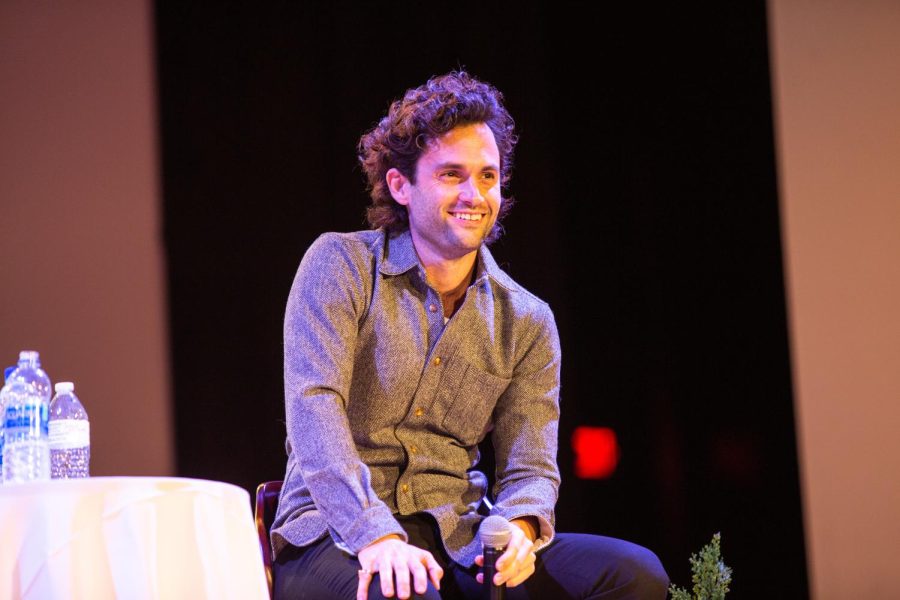 Actor+Penn+Badgley+and+Arizona+State+University+professor+Nura+Mowzoon+speak+to+students+Thursday+as+a+part+of+their+%E2%80%9CCan+We+Talk%3F%E2%80%9D+discourse+series.+The+University+of+Illinois+was+the+pairs+first+in-person+stop+since+the+pandemic+to+promote+social+change.+