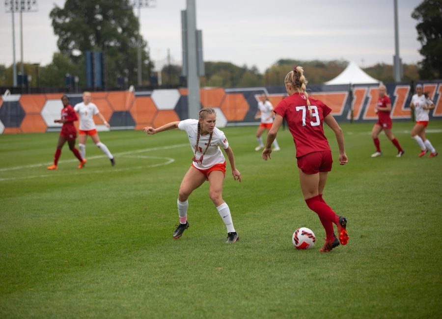 Defender+Aleah+Treiterer+guards+Rutgers+player+Oct.+23.+The+Illini+fell+3-0+to+the+undefeated+team+for+their+final+game+of+the+season.++