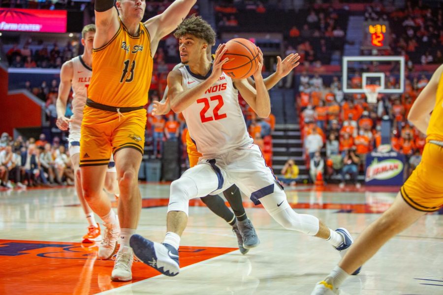 Austin Hutcherson drives to the rim during the second half of the game against St. Francis (Ill.) at State Farm Center on Saturday night. Hutcherson stood out in his Illinois debut, recording 14 points and seven rebounds in the 101-34 win.
