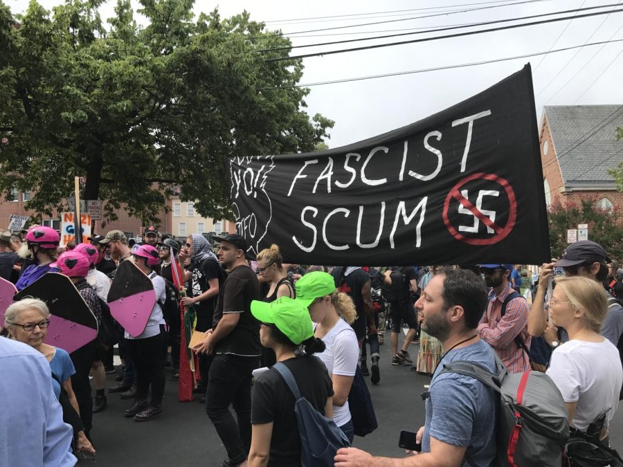 People+counter-protest+the+Unite+the+Right+rally+held+by+far-right%2C+white+supremacy+groups+in+Charlottesville%2C+Virginia+on+Aug+12%2C+2017.+Columnist+Jude+Race+believes+that+completely+banning+hate+speech+goes+against+freedom+of+expression%2C+and+its+exposure+allows+people+to+learn+and+fight+against+it.++