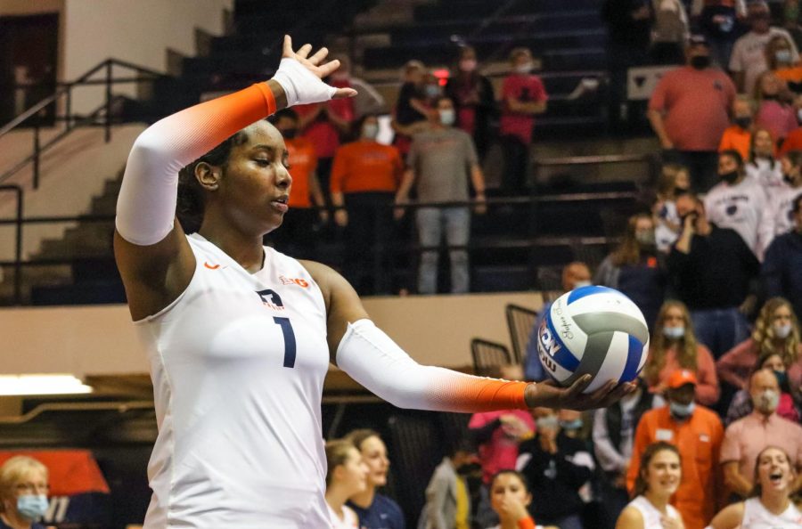 Middle blocker Kennedy Collins prepares to serve the ball against Michigan Oct. 23. The Illini won the match 3-1. 