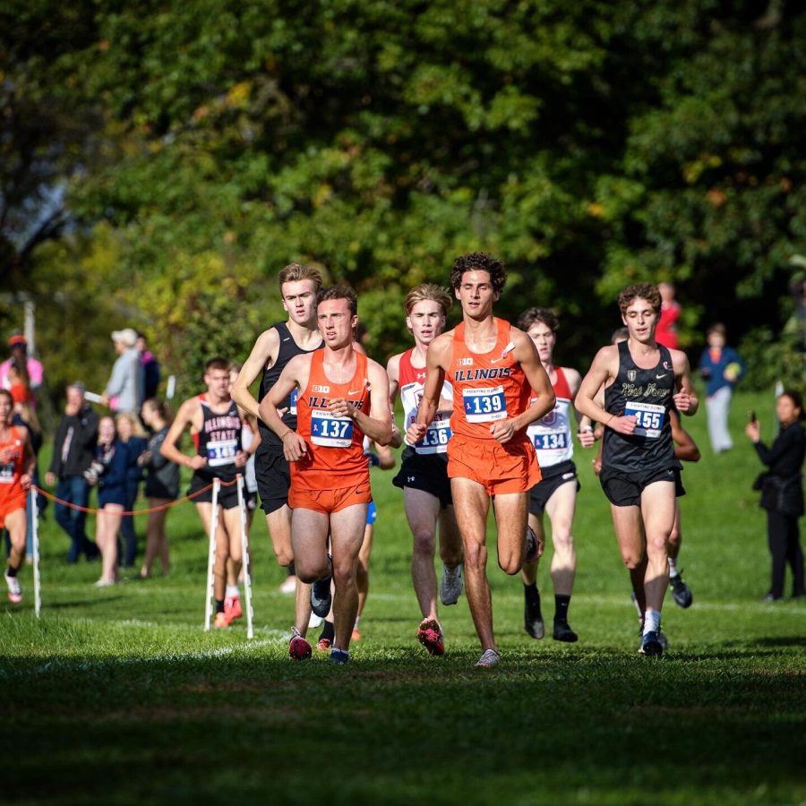 Illinois runner sophomore Ben Giblin runs beside junior Bennett Melone during Illini Open Oct. 22, the teams first and only home meet of the season. 