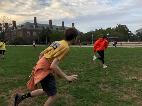 Students run around on the South Quad spraying silly string as they play capture the flag on Wednesday. This was one of many activities students could participate in for homecoming week. 