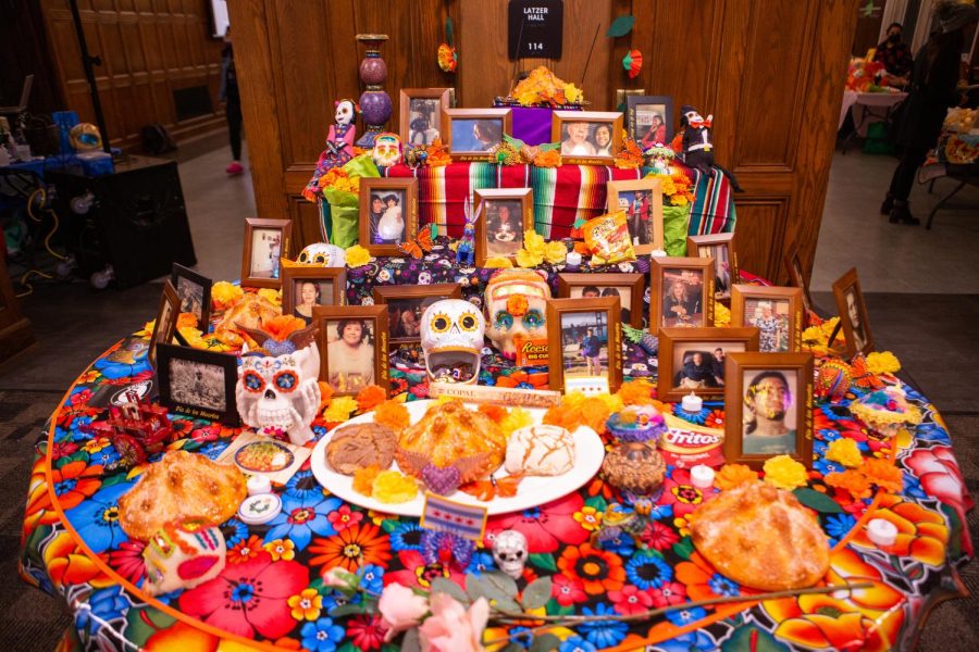 An ofrenda is displayed at the YMCA for Dia De Los Muertos to honor loved ones who have passed away on Nov. 1. Many festivities were held such as sugar skull painting and creating picture frames for passed loved ones. 