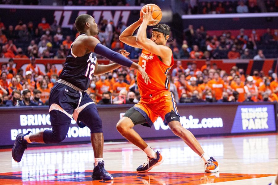 Jacob Grandison battles for position in the paint during the second half of Illinois win over Jackson State on Tuesday night. Grandison and Coleman Hawkins stepped up in big ways with several players unavailable.
