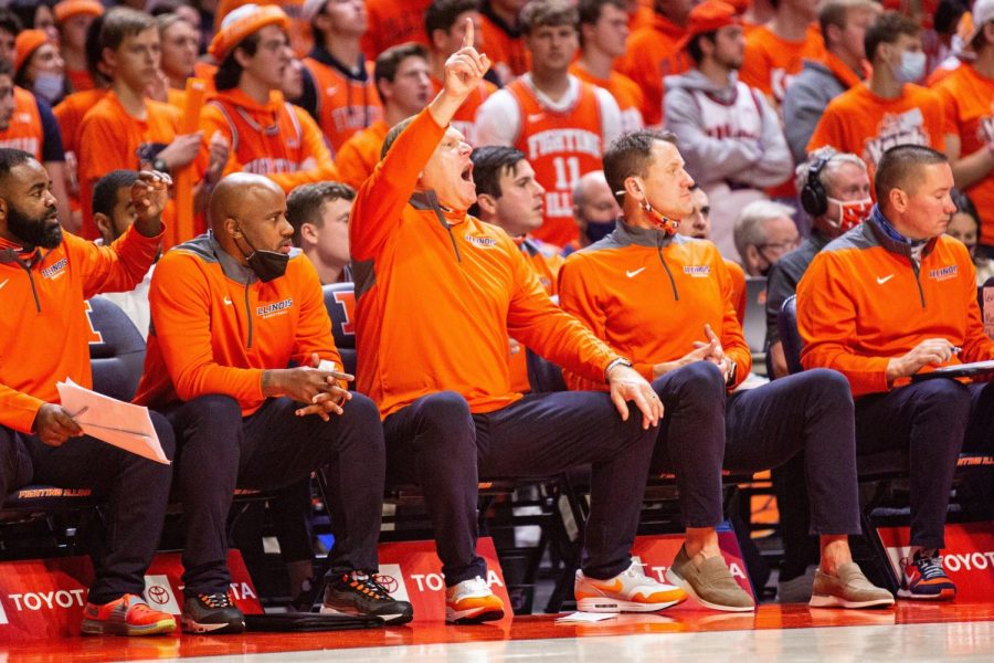 Brad Underwood and the Illinois coaching staff sits on the bench during Illinois game against Jackson State on Nov. 9. The Illini coaching staff failed to make adjustments during the teams loss on Monday.