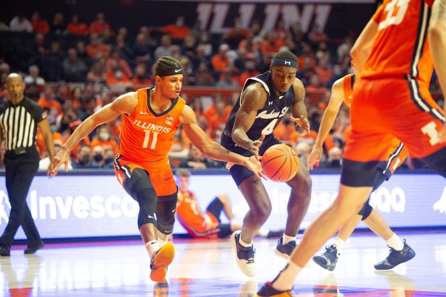 Alfonso Plummer records a steal during the first half of Illinois game against Jackson State at State Farm Center on Tuesday. The Illini opened their regular season with an emphatic 71-47 win over the visiting Tigers.