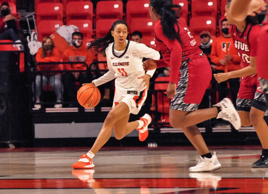 Junior+guard+Jada+Peebles+dribbles+during+the+game+against+Southern+Illinois+University+Edwardsville+at+State+Farm+Center+on+Nov.+18.+The+Illini+fell+to+Middle+Tennessee+State+today+and+leave+Florida+without+a+win.+