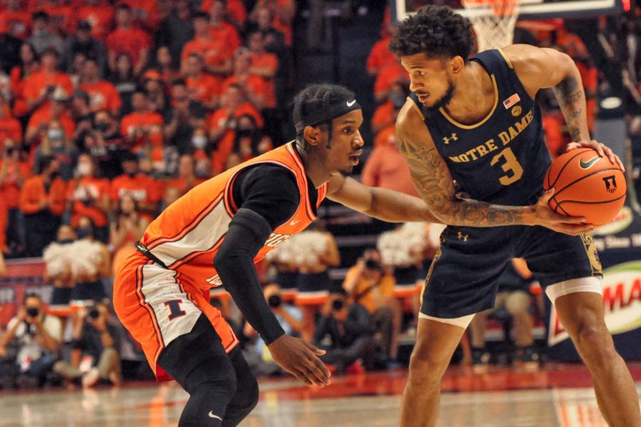 Illinois fifth-year senior guard Trent Frazier guards Notre Dames Prentiss Hubb during the first half of the Illinis 82-72 win at State Farm Center on Monday.