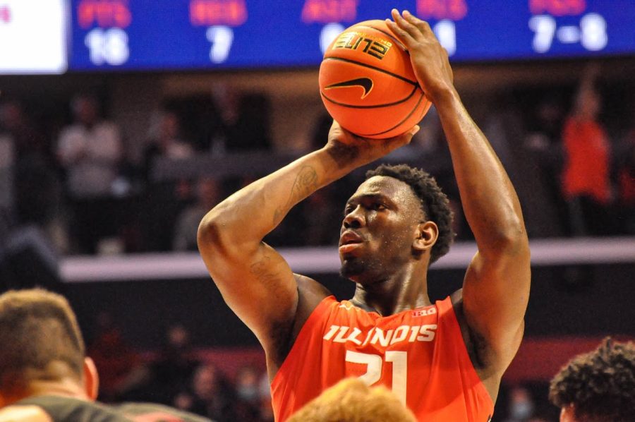 Kofi Cockburn shoots a free throw during Illinois 94-79 exhibition win over Indiana University of Pennsylvania on Friday. Cockburn has received a three-game suspension for selling team-issued gear prior to the passing of NIL legislation.  