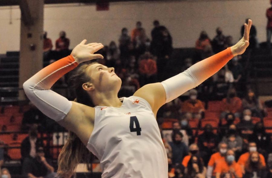 Graduate student Kylie Bruder prepares to serve a ball during Illinois match against Nebraska on Thursday. The No. 25 Illini fell to the No. 11 Minnesota Golden Gophers, 3-0, at Huff Hall on Saturday night.