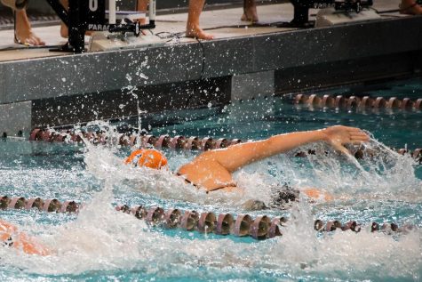 Swimmer Abby Cabush swimming freestyle during one of her meets this season. Cabush broke the schools record for the 200-yard freestyle and the team placed first overall. 