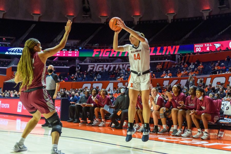 Forward Kendall Bostic attempts a three pointer during the game against North Carolina Central Tuesday at State Farm Center. Bostic and Aaliyah Nye dominated the court during the season opener.
