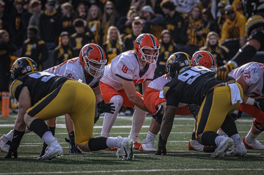 Illinois quarterback Brandon Peters prepares for a snap during the teams game at Iowa on Saturday. The Illini offense stalled after a fast start while the team allowed the most points since game three in a 33-23 loss to the Hawkeyes.