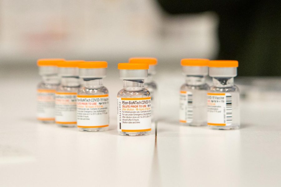A grouping of pediatric Pfizer doses sit on a table at the Carle Health vaccination pop-up on Nov. 6. Students are nervous about the new Omicron Variant spike and have fears over what the spring semester will look like.