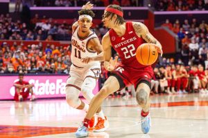 Illinois guard Alfonso Plummer guards Caleb McConnell during the game against Rutgers on Saturday at State Farm Center. Plummer led the Illini with a game-high 24 points in the 86-51 win.
