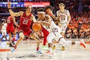 Alfonso Plummer drives to the basket during Illinois mens basketballs 86-51 win over Rutgers at State Farm Center on Friday. Plummer has been elite for the Illini this season, establishing himself as a primary scorer.