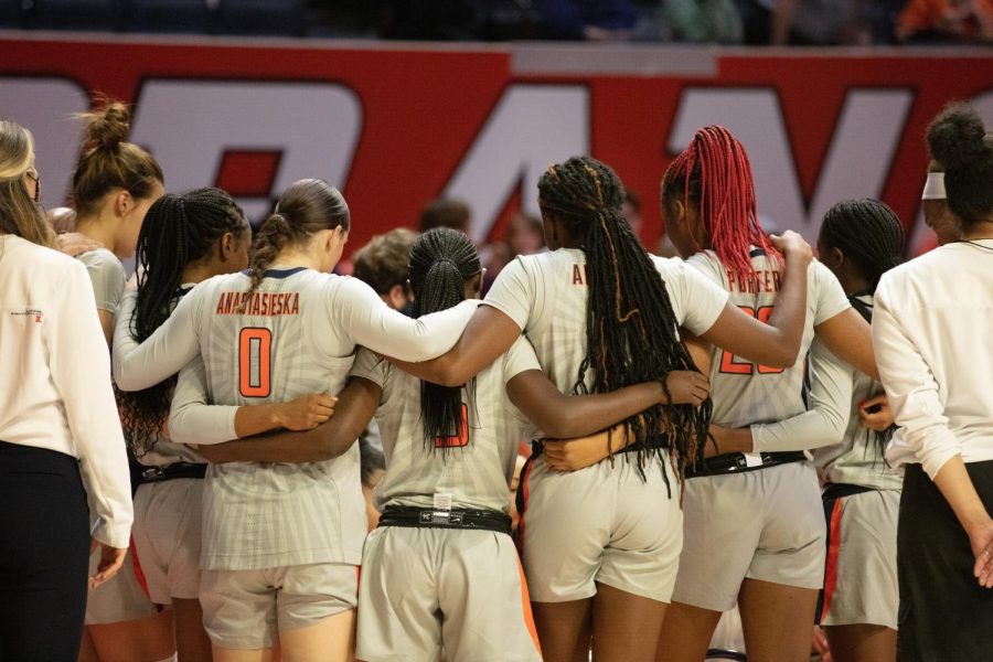 The Illinois womens basketball team huddles during its game against Eastern Kentucky at State Farm Center on Dec. 5. The Illini mens and womens basketball teams had games affected by COVID-19 cases within each program.