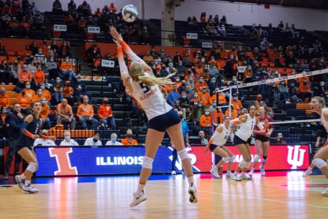 Setter Diana Brown reaches for the ball during the game against Indiana on Nov. 12. The team is traveling to Austin, Texas to compete against Nebraska in the Sweet 16 of the NCAA tournament.