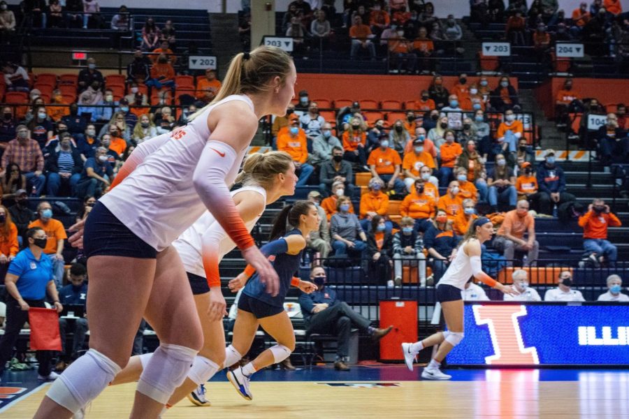 Illinois volleyball prepares for a serve during the match against Indiana at Huff Hall on Nov. 12. The Illini took down the West Virginia Mountaineers to advance in the NCAA tournament on Friday.