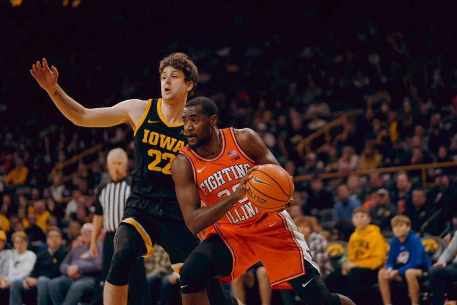 DaMonte+Williams+drives+to+the+basket+during+Illinois+87-83+win+at+Iowa+on+Monday+in+Iowa+City.+The+Illini+out+rebounded+the+Hawkeyes+52-23+and+grabbed+19+offensive+boards.