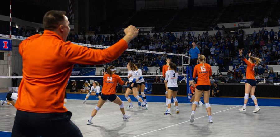 The+Illinois+volleyball+team+celebrates+after+their+win+against+Kentucky+on+Dec.+4.+The+team+attributes+their+success+to+their+on+road+games+during+the+conference+play.