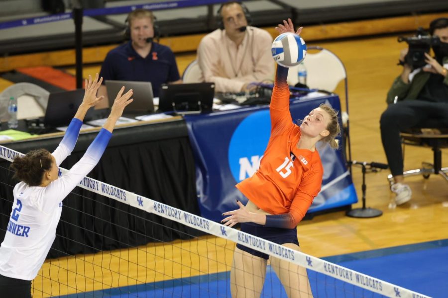 Illinois outside hitter Megan Cooney goes up for a spike during the match against Kentucky in Lexington on Saturday. The Illini beat the No. 7 Wildcats in four sets to advance to their first Sweet 16 since 2018.