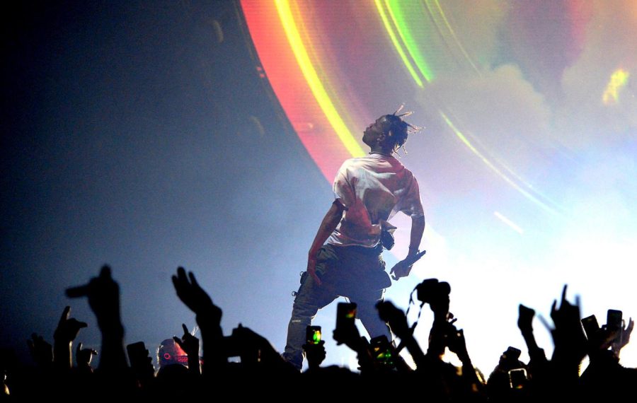 Travis Scott performs at the Spectrum Center in Charlotte, North Carolina on March 24, 2019. Columnist Aparna Lakkaraju argues that COVID-19 is making it tough to reestablish proper crowd behavior at concerts.