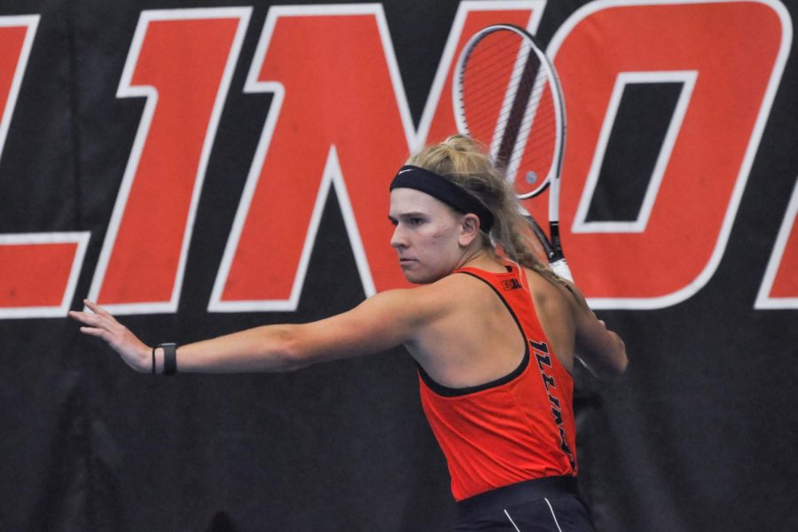 Illinois womens tennis freshman Megan Heuser prepares to hit the ball during her doubles match with sophomore Kate Duong against Eastern Illinois on Sunday. The Illini will heading to Florida for the ITA Kickoff on Saturday and Sunday. 