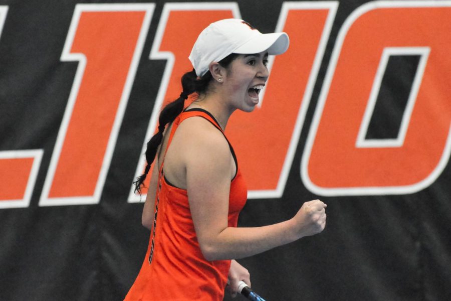 Illinois+womens+tennis+Kate+Duong+celebrates+during+her+doubles+match+with+Megan+Heuser+against+Chicago+State+on+Jan.+23.+Duong+and+Heusers+strong+partnership+aids+in+the+teams+success+for+doubles.+