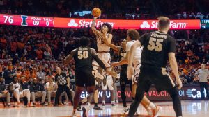 Andre Curbelo shoots a floater during No. 17 Illinois game against No. 4 Purdue at State Farm Center on Monday. Curbelo looks back at his journey from his injury to his return to the line up after missing 11 games.
