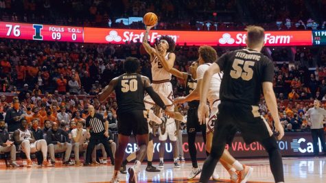 Andre Curbelo shoots a floater during No. 17 Illinois game against No. 4 Purdue at State Farm Center on Monday. Curbelo made his return after missing 11 games with a concussion.