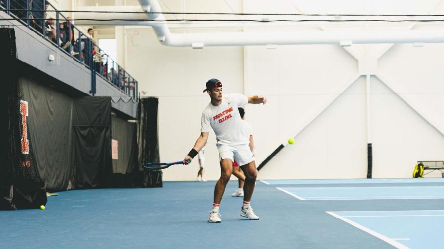 Graduate student Olivier Stuart swings his racket during a tennis match at Atkins Tennis Center. The team lost in Mississippi this weekend against Carolina State and Oklahoma. 
