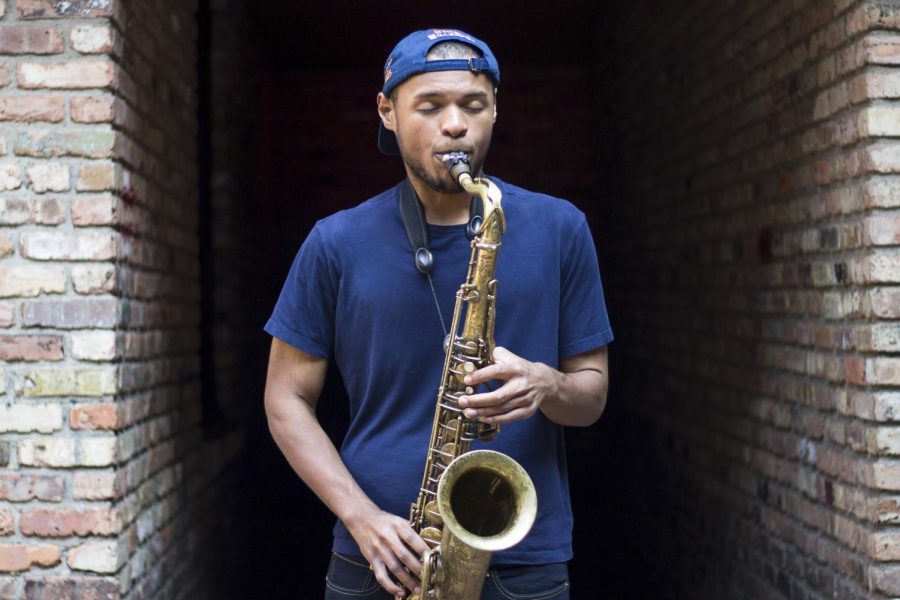 Kevin+King+plays+the+saxophone+outside+of+The+Canopy+Club+on+Sept.+20%2C+2019.+King%2C+a+graduate+of+FAA%2C+plays+a+wide+range+of+instruments%2C+but+has+been+more+drawn+to+the+saxophone.+