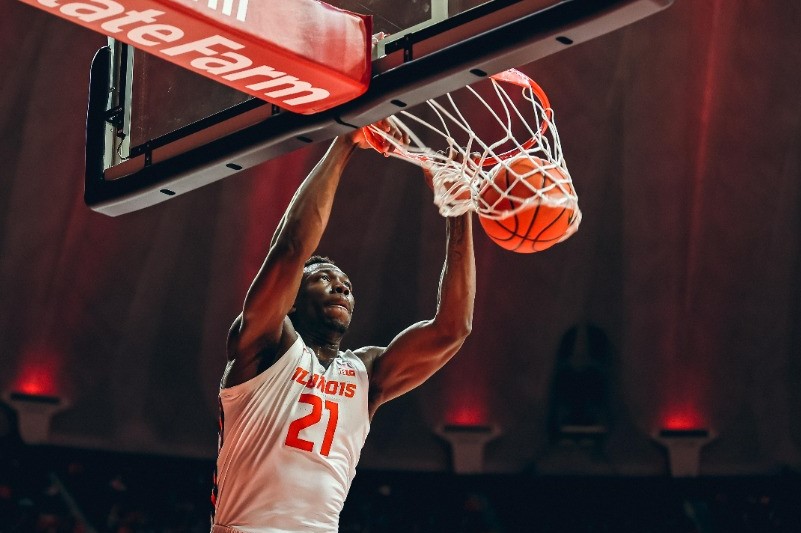 Center Kofi Cockburn dunks during the game against St. Francis on Dec. 18. Columnist Caroline Tadla believes that Cockburn should be treated and seen the same as an average student. 
