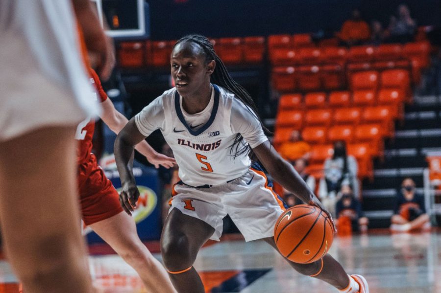 Guard+DeMyla+Brown+dribbles+towards+the+hoop+during+the+game+against+Wisconsin+on+Jan.+9.+The+Illini+fell+to+Penn+state+72-90.+