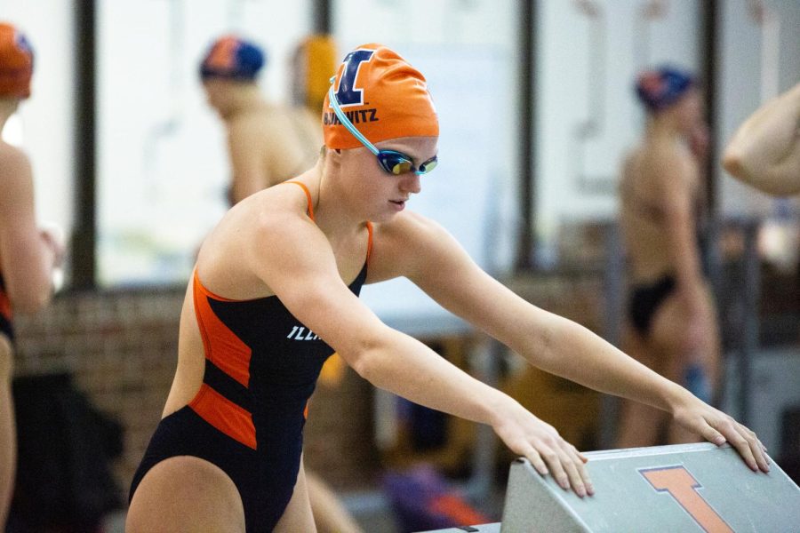 Sophomore Sophia Burwitz gets ready at the diving block before her event during the Orange and Blue meet on Oct. 9. The Illini will be heading to Madison for the Big Ten Championships.