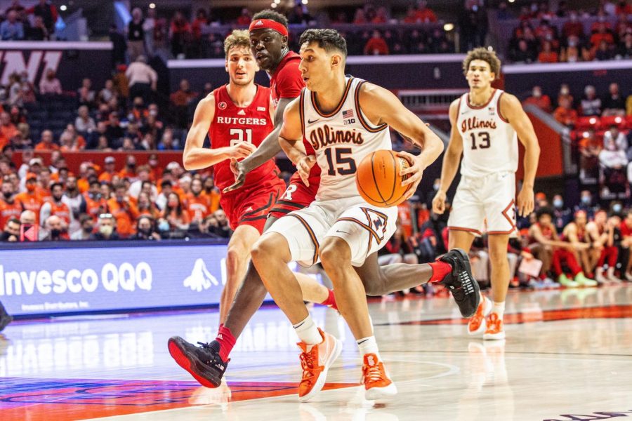 Freshman guard RJ Melendez drivers to the basket during Illinois game against Rutgers at State Farm Center on Dec. 3. Melendez sparked a late run on Wednesday night against the Scarlet Knights in New Jersey, but it wasnt enough as the Illini lost, 70-59. 