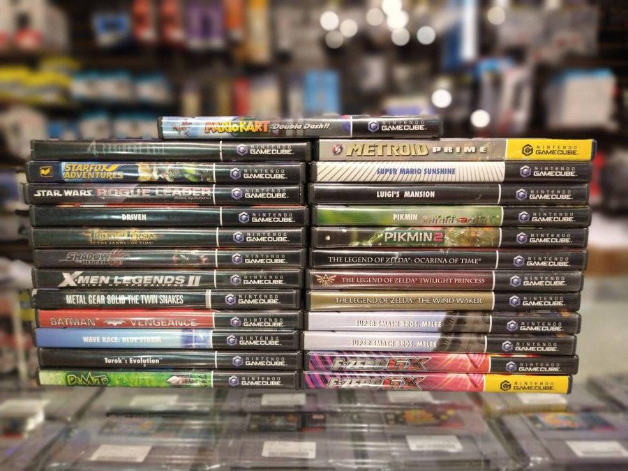 A stack of Nintendo Gamecube games at the Live Action Games store on Dec. 11. The store is located in Champaign and has a large supply of retro video games.  