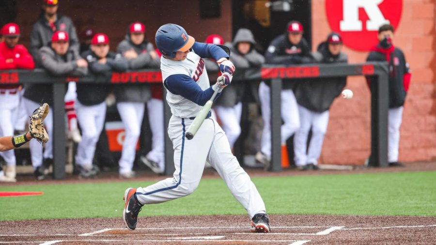 Junior Jacob Campbell swings his bat during a game against Rutgers. The Illini begun their season last weekend and currently stand at 1-2.  