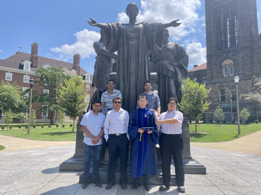 Researchers Sudheer Salana (left), Professor Vishal Verma, Yixiang Wang, Joseph Puthussery, and Haoran Yu pose in front of the Alma Mater statue. They have discovered concerning levels of air pollution when it comes to rural areas. 