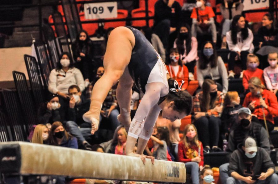 Gymnast Kaitlyn Ewald balances during her beam event during the competition against Feb. 6. During the previous meet, Ewald and teammate Mia Takekawa both tied a team high for bars. 