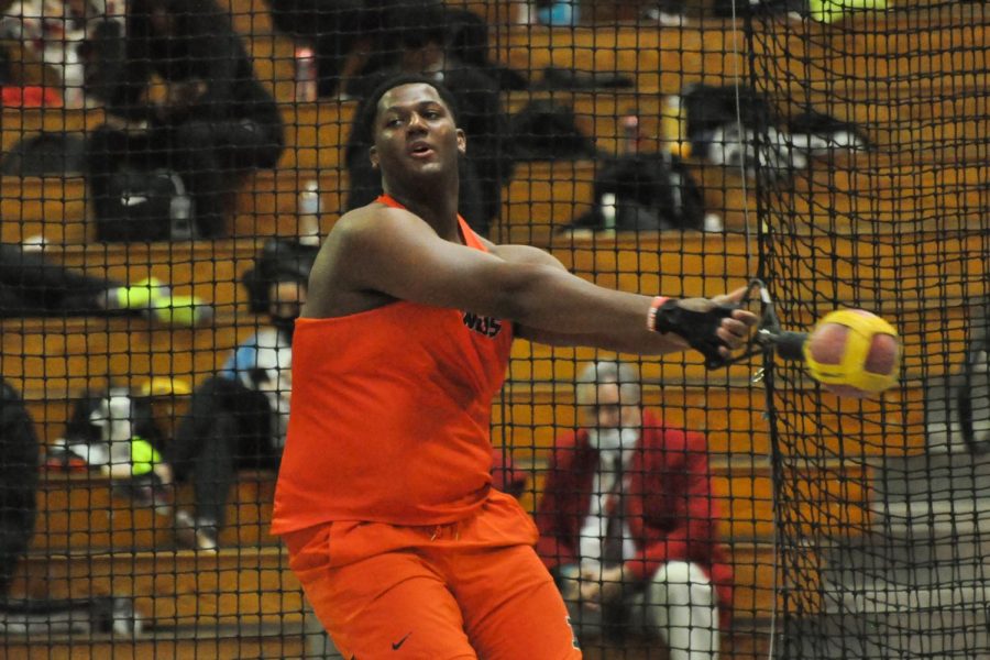 Thrower Tyler Sudduth prepares to launch the weight during his weight throw event during the Illini Invitational on Jan. 22. The Illini will be back home on Friday for the Illini Classic. 