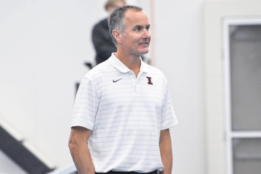 Illinois mens tennis head coach, Brad Dancer, observes a singles match against Chicago State on Jan. 22. The Illini will have two matches at Atkins on Saturday against Duke and Northern Kentucky, and one match on Sunday against UNC. 