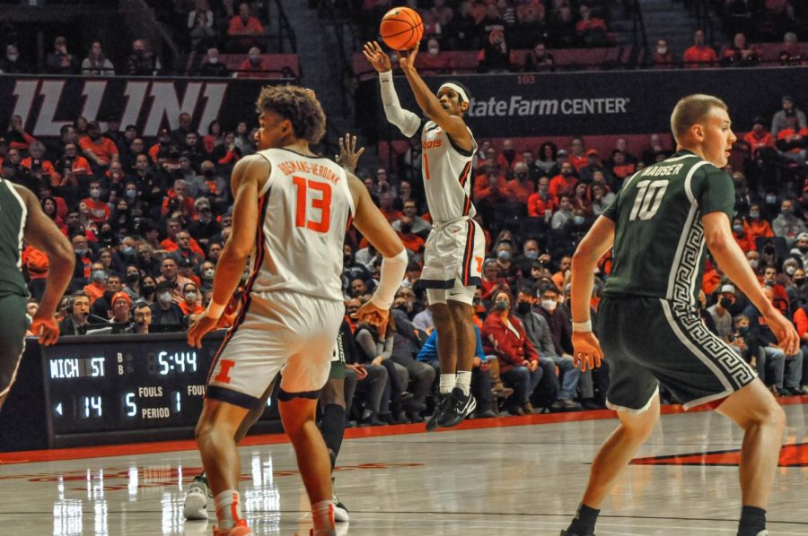 Jacob Grandisons efficiency, late Trent Frazier triple seal Illinois mens basketballs road win at Michigan State