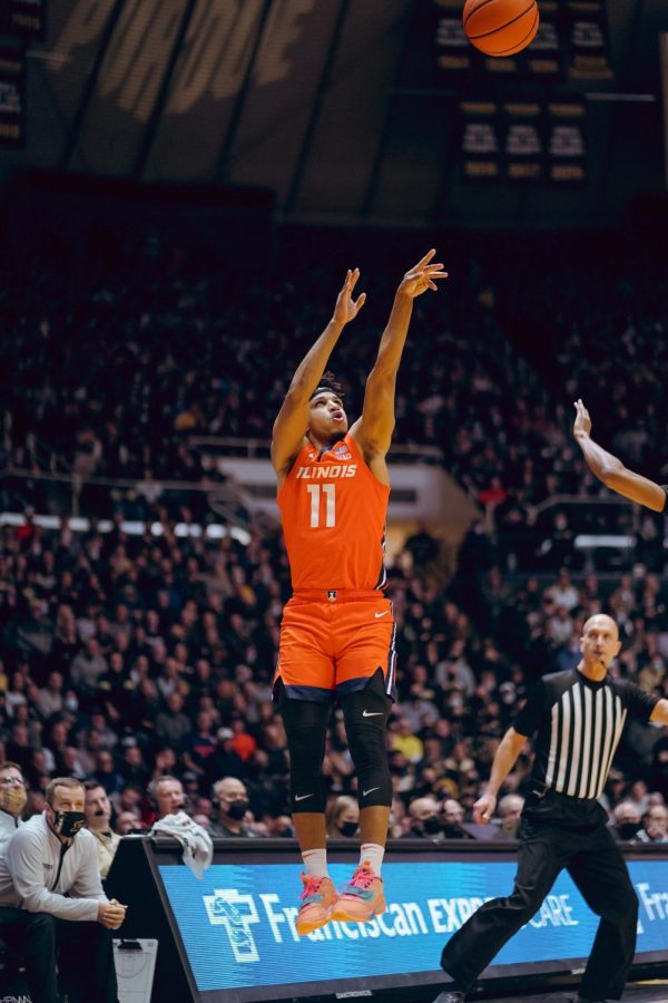 Graduate student guard Alfonso Plummer attempts a 3-pointer during the first half of Illinois mens basketballs game against Purdue at Mackey Arena in West Lafayette, Indiana, on Tuesday night.