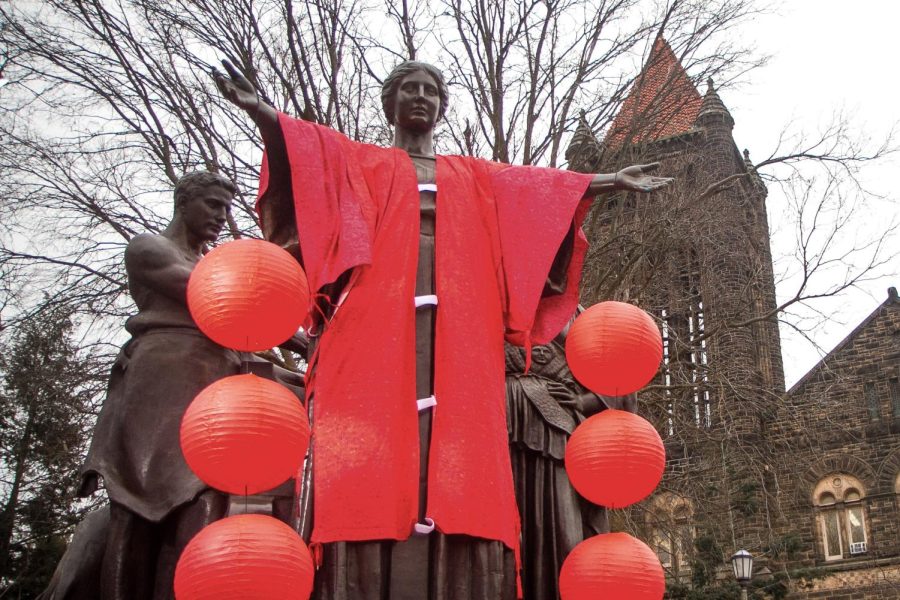 The Alma Mater statue is  decorated in celebration of the Lunar New Year on Feb. 5, 2019. Some students plan on celebrating the Lunar New Year by having a big feast and hanging out with friends. 