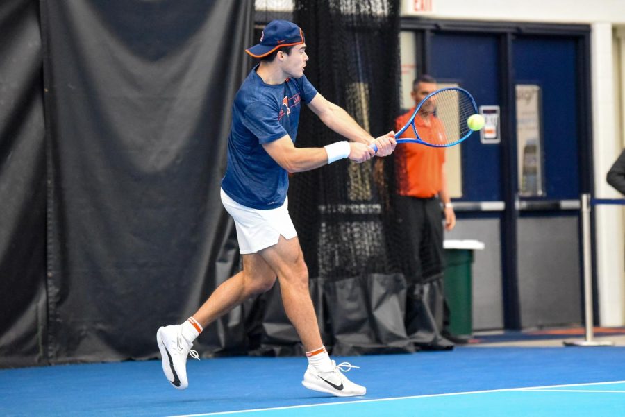 Graduate student Oliver Stuart hits the ball during his singles match against Duke on Feb. 19. Stuart and his doubles partner, redshirt junior Siphosothando Montsi, gain a spot at No. 61 after their performance against Fairleigh Dickinson on March 16. 