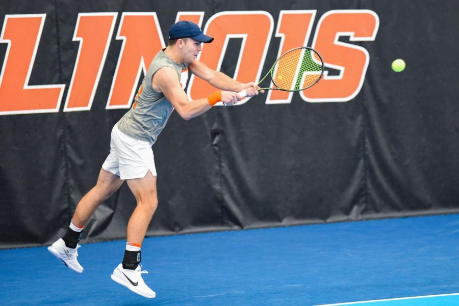 Redshirt sophomore Lucas Horve goes to hit the ball during his doubles match with sophomore Hunter Heck against Duke on Feb. 19. The Illini will be on the road up against Fairleigh Dickinson and Florida on Wednesday, and Central Florida on Friday. 