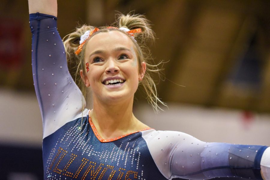 Gymnast Abby Mueller poses at the end of her floor exercise routine against Rutgers on Feb. 25. The Illini will be home for Fridays meet against Central Michigan, Boise State, and Northern Illinois. 